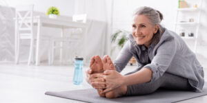 Woman stretching on a mat