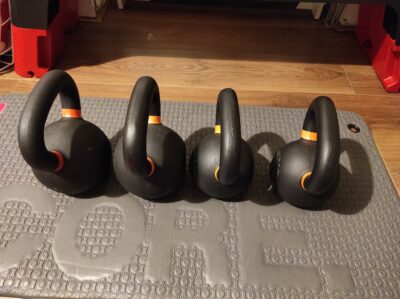 Four kettlebells from Mirafit, two of 12 kg and two of 16 kg