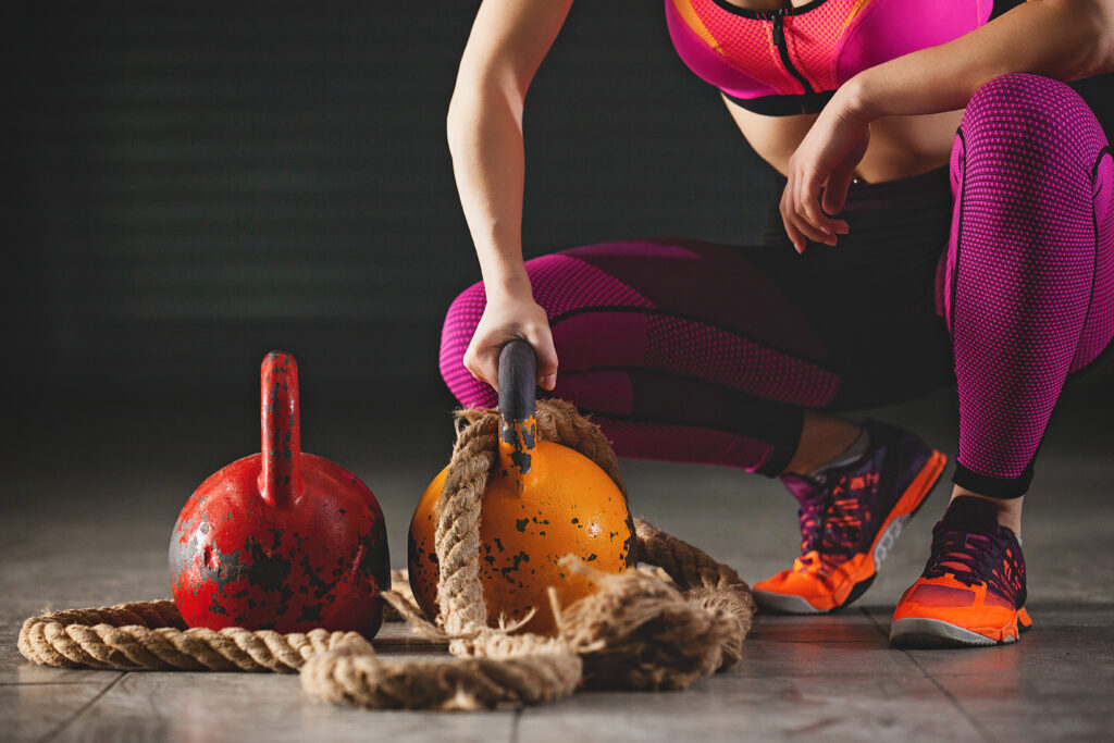 Woman getting ready for kettlebell training